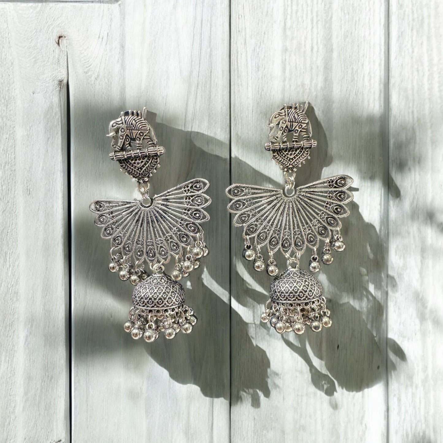 Majestic Peacock Silver Jhumkas